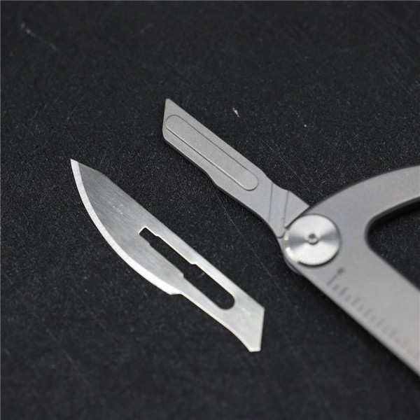 Titanium Multi-functional Quick Keychain With Hiden Replaceable Surgery Blade